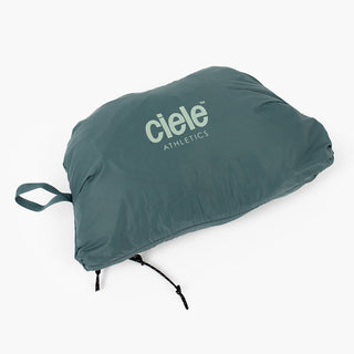 view of the ciele athletics VNTJacket lightweight running jacket for men in silver pine color when folded in one of it's pocket