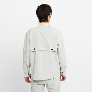 back view of ciele athletics CCJacket unisex running jacket from the Lifestyle Edition collection, in light grey color, on a model