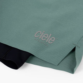 detail view of the reflective ciele logo on the ciele athletics WRKShort unisex running and technical short from the Lifestyle Edition collection, in silver pine color