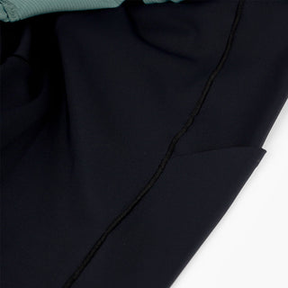 detail view of the phone pocket in the half tight of the ciele athletics WRKShort unisex running and technical short from the Lifestyle Edition collection, in silver pine color