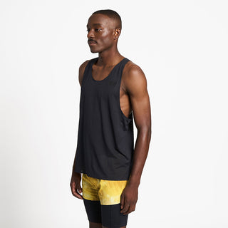 side view of the ciele athletics lightweight, race ready and performance driven singlet named RDSinglet in shadowsphinx color, on a model