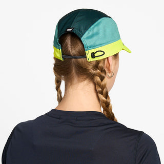 back view of the ciele athletics FTSCap unisex running hat in seaweed color, on a model