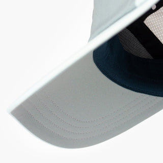 underbrim view of the ciele athletics FSTCap unisex running hat with a curved brim in neutral grey color