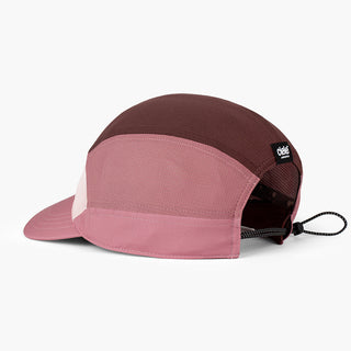 back view of the ciele athletics FTSCap unisex running hat with a curved brim in peachskin color