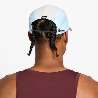 back view of the ciele athletics FTSCap unisex running hat with a curved brim in white color, on a model