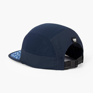 back view of the ciele athletics GOCap unisex running hat in indigo color