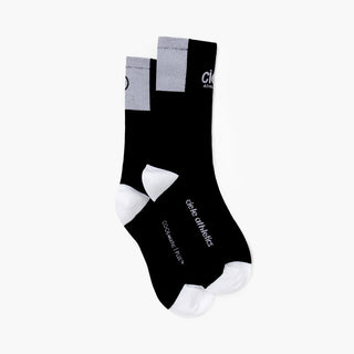 black socks with white accents on a white background