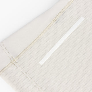 close view of the back reflective detail on the ciele athletics DLYTshirt lightweight and performance driven T-Shirt in rainy day