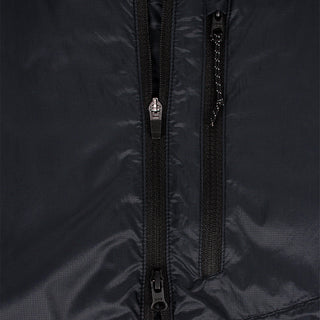 closeup view of the double sided zipper of the ciele athletics VNTJacket lightweight running jacket for men in shadowcast color