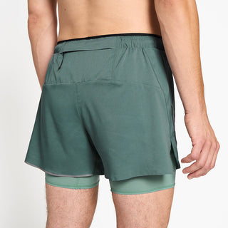 close back view of ciele athletics DLYShort 5 inch with a long brief in silver pine color on a model