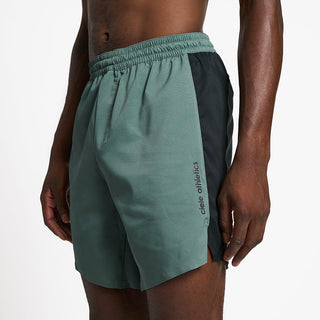 close front view of ciele athletics TRNShort 7 inch linerless short in silver pine color on a model