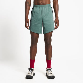 front view of ciele athletics TRNShort 7 inch linerless short in silver pine color on a model