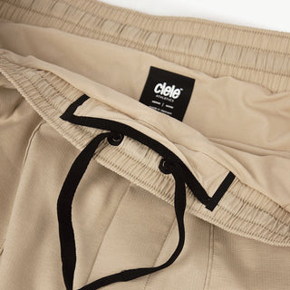 close view of the waistband of the ciele athletics ATShort 5 inch with liner short in safari color