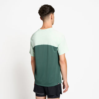 back view of ciele athletics DLYTShirt lightweight and performance driven T-Shirt in dusty turquoise on a model