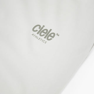 close view of the reflective logo on the ciele athletics DLYTshirt lightweight and performance driven T-Shirt in light grey