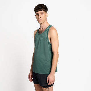 side view of ciele athletics FSTSinglet lightweight and performance driven singlet in silver pine on a model