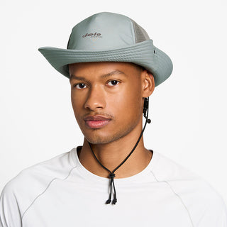 front view of the ciele athletics TRLBucket unisex running bucket hat in neutral grey color, on a model