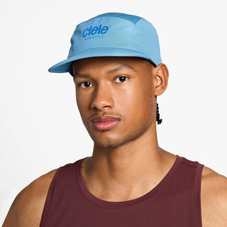 front view of the ciele athletics GOCap unisex running hat in dusty blue color, on a model