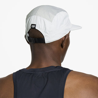 back view of ciele athletics GOCap unisex running hat in shadowcast color on a model