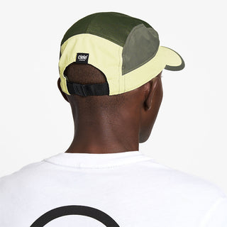 back view of ciele athletics GOCap C Classic C Plus Box unisex running hat in glade color on a model