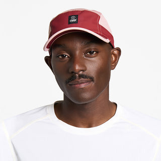 front view of ciele athletics GOCap C Classic C Plus Box unisex running hat in merlot peachskin color on a model