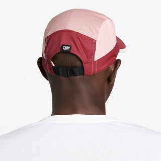 back view of ciele athletics GOCap C Classic C Plus Box unisex running hat in merlot peachskin color on a model