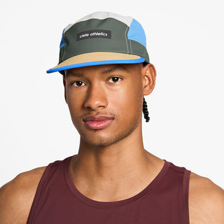 front view of the ciele athletics GOCap unisex running hat in seaweed color, on a model