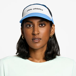 front view of the ciele athletics FTSCap unisex running hat in white cobalt color, on a model
