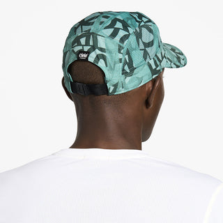 back view of ciele athletics GOCap SC Field Loopy unisex running hat in lightgrey color on a model