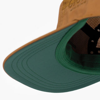 underbrim view of the ciele athletics GOCap Comp Bars unisex running hat in dark ochre color