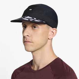 side view of ciele athletics GOCap EQ Frames unisex running hat in whitaker color on a model