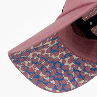 underbrim view of the ciele athletics FSTCap unisex running hat with a curved brim in deco rose color