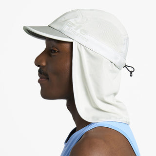 side view of ciele athletics GOCap PYN Comp one hundred unisex running bucket hat in light grey color on a model