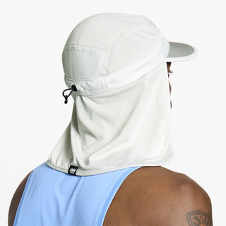 back view of ciele athletics GOCap PYN Comp one hundred unisex running bucket hat in light grey color on a model