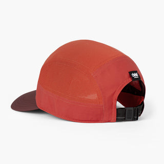 back view of the ciele athletics GOCap with a curved brim unisex running hat in clay color