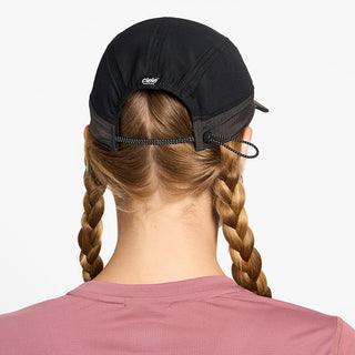 back view of ciele athletics FSTCap Icon Circle C unisex running hat in shadowcast color on a model