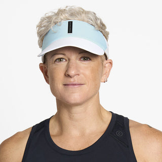 front view of ciele athletics FSTCap Comp Iconic VC unisex running hat in skyblue color on a model