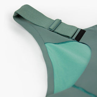 close view of the hook-and-eye back closure on the ciele athletics SPDBra running bra in silver pine