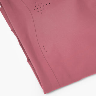 close view of the laser perforations on the ciele athletics SPDBra running bra in deco rose