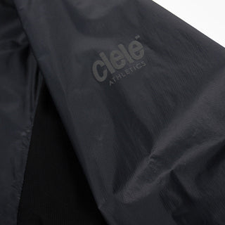 closeup view of the inside pocket logo of the ciele athletics VNTJacket lightweight running jacket for women in shadowcast color