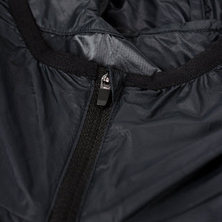 closeup view of the zipper of the ciele athletics VNTJacket lightweight running jacket for women in shadowcast color