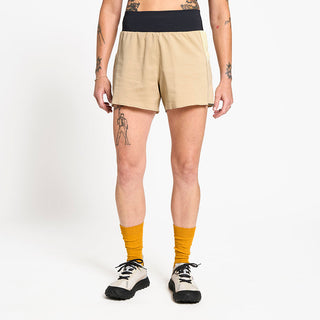 front view of ciele athletics TRNShort 4 inch with a brief in safari color on a model