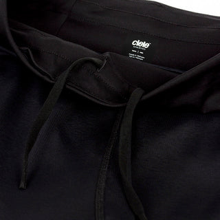 close view of the C logo and reflective details on the ciele athletics TRNShort 4 inch with a brief in shadowcast color