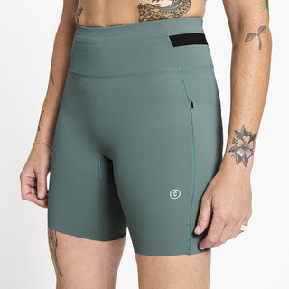 back view of ciele athletics FSTTight short running short in silver pine on a model