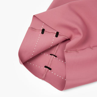 close view of the trimmable feature on the ciele athletics FSTTight short running short in deco rose