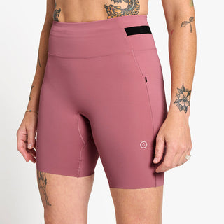 back view of ciele athletics FSTTight short running short in deco rose on a model