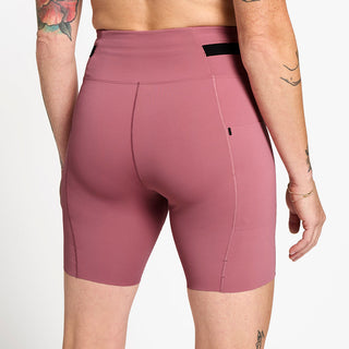 side view of ciele athletics FSTTight short running short in deco rose on a model