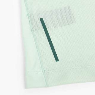 close view of the back reflective detail on the ciele athletics DLYTshirt lightweight and performance driven T-Shirt in dusty turquoise