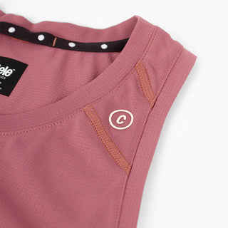 close view of c logo on the ciele athletics FSTSinglet lightweight and performance driven singlet in deco rose