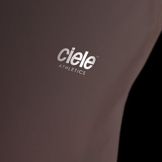 close view of the back reflective detail on the ciele athletics DLYTSinglet lightweight and performance driven singlet in peachskin, when reflective